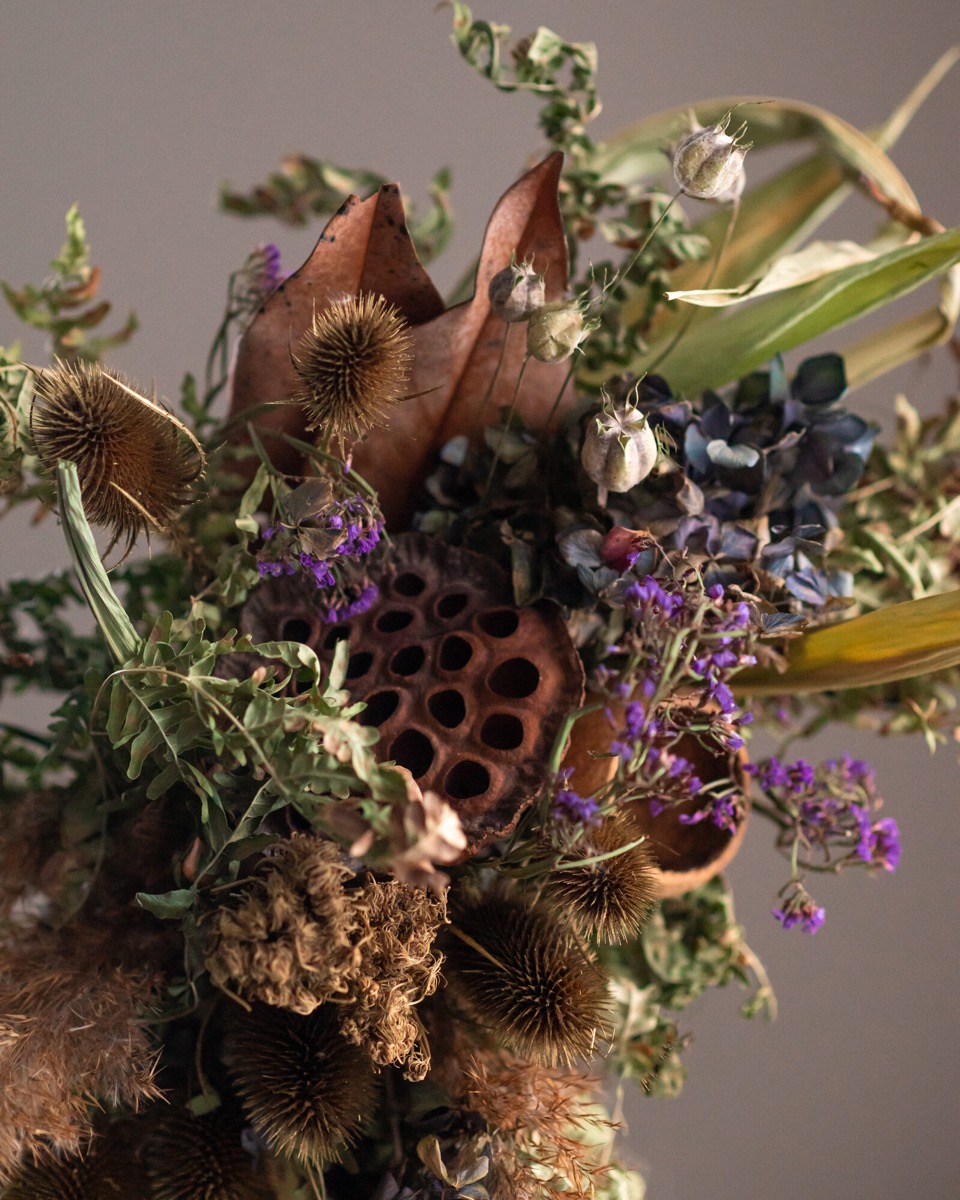 Vibrant red and pink dried flower bouquet with craspedia and lavender